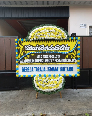 Papan Bunga Duka di Maima